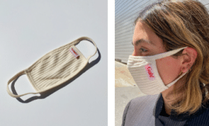 Woman wearing a face mask COVID testing fir to fly 